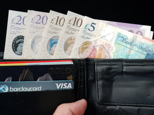 Top bosses took less than three working days to earn the average Surrey worker's annual pay