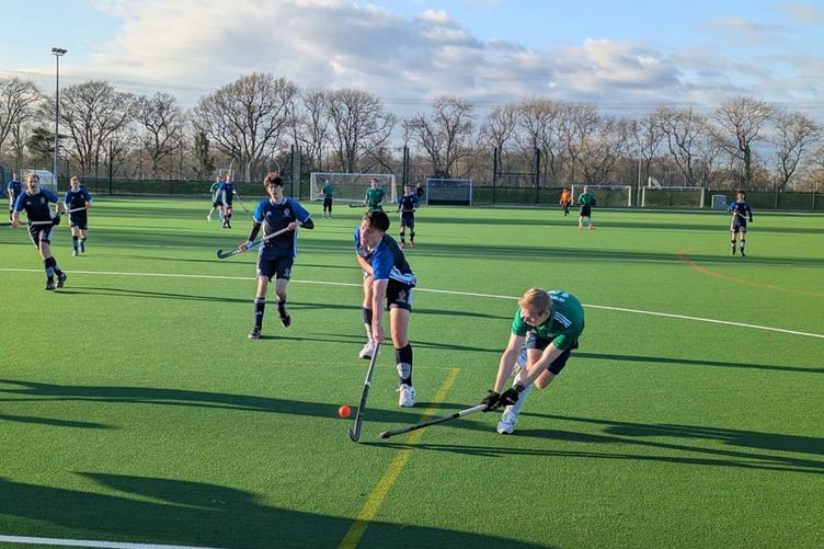Action from Haslemere Hockey Club's men's second team's 2-1 win at Wimborne