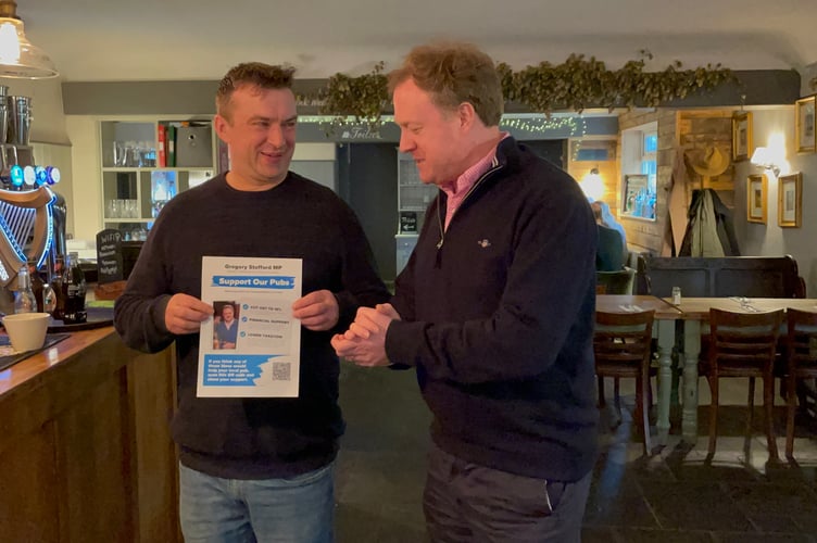 Greg Stafford MP discusses his pub campaign with Robin Catchpole of The Bluebell in Dockenfield.