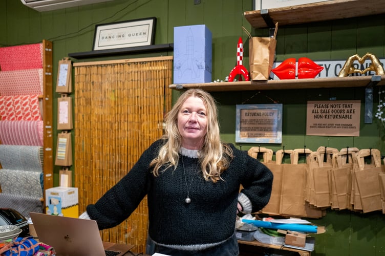 Inge Dunbar owner of Sass & Spirit,  Haslemere, that has seen a raise in shop lifting and shop thefts, Haslemere, Surrey, 23rd January 2025 . Photo released January 27 2025. Fed up business owners in a market town have launched a vigilante WhatsApp group - after a rise in "well-off middle-aged" shoplifters. Traders in Haslemere, Surrey say shoplifting has gotten so bad in recent months that messages are sent in the messaging group "every single day". Shop owners let each other know if they have been stolen from and share CCTV footage of criminals to look out for - with members aware of a few repeat perpetrators. They say the problem has been exacerbated by a "lack of police presence" in the town and insist that it is not linked to the cost of living crisis.