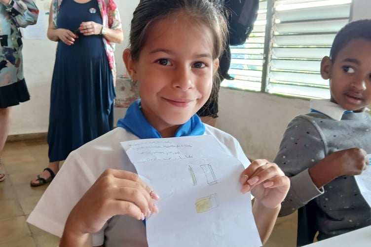 Children at a rural primary school in Viñales, Pinar del Río, holding letters from Camelsdale Primary School