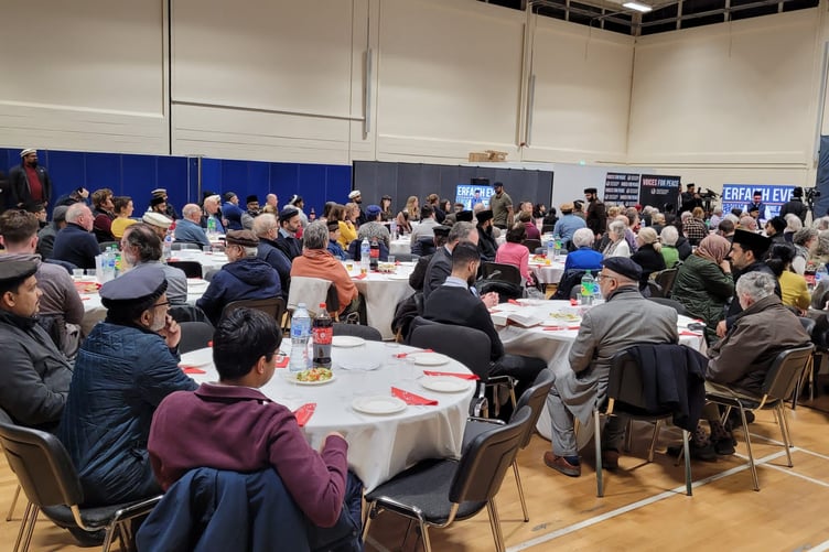 Guest in attendance for speeches at Mubarak Mosque, Tilford