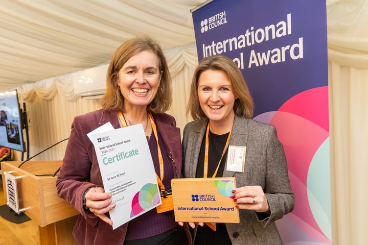 Kay Goldsworthy, Head of St Ives School and Kerry Phipps, Head of Languages at St Ives School holding their International Schools Award