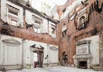 Heritage charity launches court challenge over fire-ravaged stately home plans