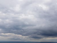 Partly cloudy with light breezes today and overcast tomorrow