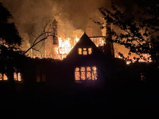 WATCH: Historic house severely damaged in late-night blaze