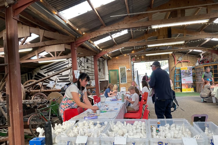Children painting at the Surrey Hills Spring Fair 2025.