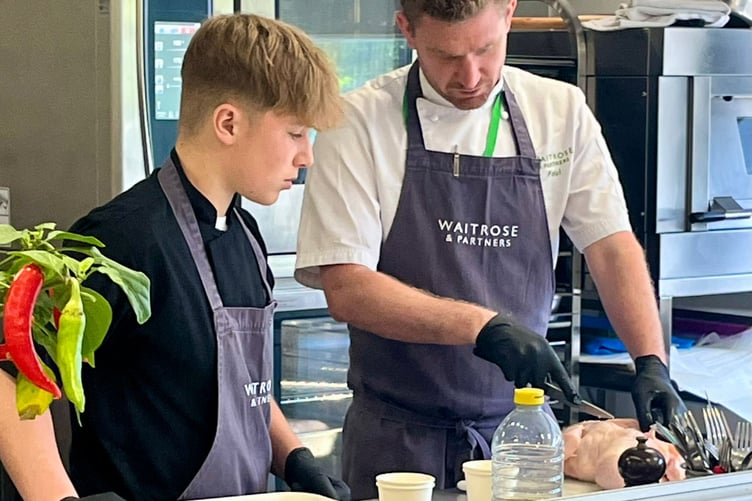 Ben Budd learning off of a Waitrose chef