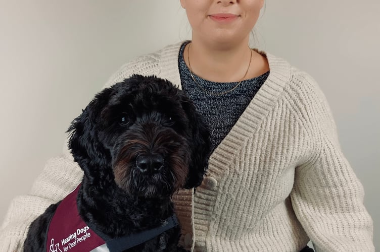 Eleanor with her hearing dog, Fig a Cockapoo 