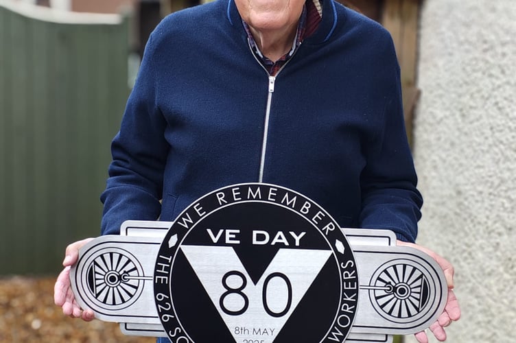 Haslemere artist Phil Bates' stainless steel memorial at historic signal box, honouring fallen railway workers