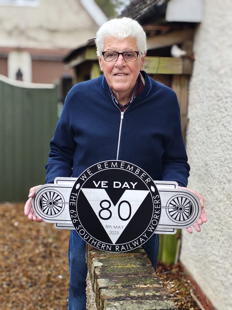 Haslemere artist Phil Bates' stainless steel memorial at historic signal box, honouring fallen railway workers