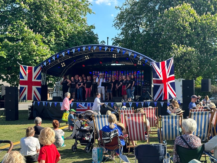 A Spitfire flypast, live music and stories from the war marked Haslemere’s VE Day celebration on Lion Green