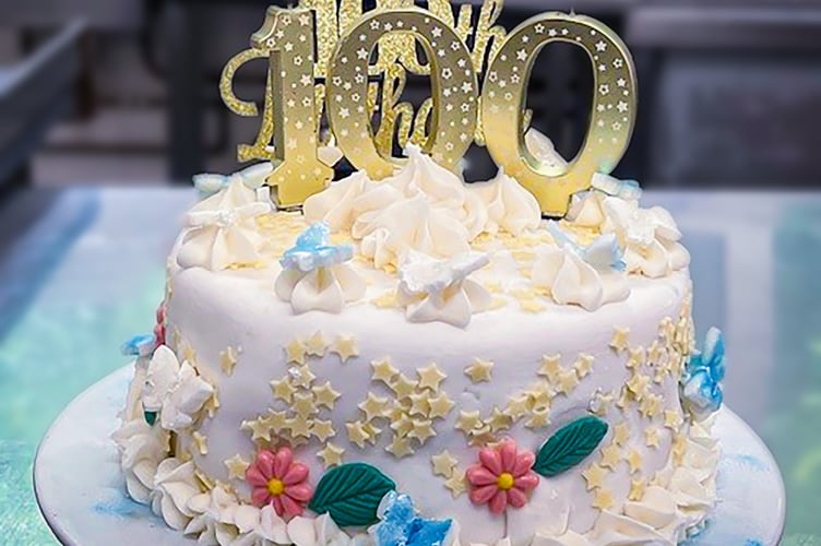 celebratory 100th birthday cake for Joyce Douglas, at Redcot Residential Care Home in Haslemere