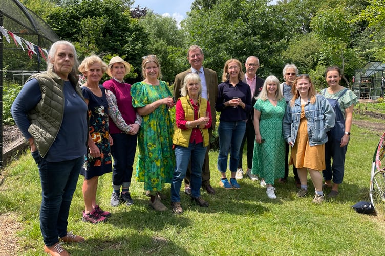 Lord-Lieutenant of Surrey, Michael More-Molyneux, centre, with space2grow staff and volunteers at the Big Lunch event in Farnham on Friday, June 6.