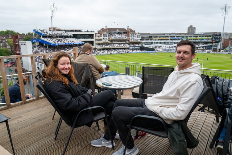 Olga Tyurina and friend  Ollie Carter.  At Oval Mansions, whoâs residents have access to the balcony overlooking The Oval cricket ground, London, 3rd June 2025 . A flat overlooking The Oval which boasts some of the finest views in English cricket is up for sale for £400,000.The plush properties at Oval Mansions in south London - some of which sell for nearly £1m - are the most coveted in the sporting world due to the building's stunning roof terrace.Tenants are able to invite friends up to watch matches, though limitations are sometimes enforced for the highest-profile games. During the Ashes series between England and Australia, spots on the terrace are so highly sought after that plus ones are limited to just one per flat, with management regularly having to eject those who manage to sneak in.