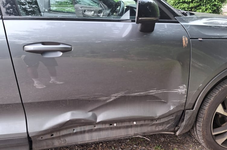 Frensham Damaged car