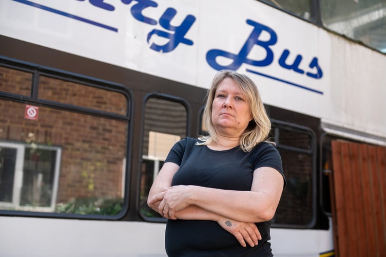 Wendy Salmon, who is being forced to move her bus from her front garden. Frimley, 13th June 2025  A woman has been slapped with an ASBO and forced to remove a bus being renovated in her drive - after complaints from 'snobby' neighbours it was 'ruining the ambience.' Wendy Salmon parked the vehicle on the drive at the end of a cul-de-sac in a posh Surrey street as she wanted to turn it into a cafe business. But she accused one neighbour of 'rallying' the street against her by complaining. And despite the council accepting she was 'not breaking any laws' she has been hit with a CPN and ordered to remove it by 20 June following a bitter two year legal battle.