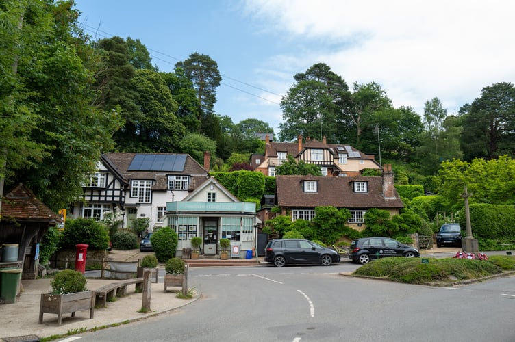 General view of Peaslake village, where Broadband for Surrey Hills has installed internet lines for residents. Peaslake, Surrey, 12th June 2025 .  Release date â June 18, 2025.  Welcome to the leafy village where locals installed their own broadband - after traditional telecoms providers 'failed' to connect their homes.  People in certain parts of the rural Surrey Hills have for years struggled with sluggish broadband - plagued by phone calls cutting out and constantly buffering Wi-Fi. Residents say they have been "forgotten" by big companies, who focus on easier-to-connect towns and deem their villages "too rural to deal with". As a result, former investment banker Anthony Townsend, who lives in Cranleigh, decided to take matters into his own hands - inspired by a community organisation called Broadband for Rural North (B4RN). B4RN had started laying fibre optic cable to thousands of homes without internet in Cumbria - by installing underground cabling in gardens and fields. The founder, Barry Forde, gave his designs to Mr Townsend for free, and so, Broadband for Surrey Hills (B4SH) was born. 