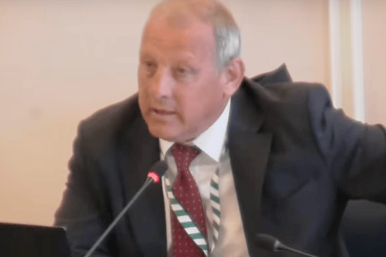 Cllr George Murray addresses a meeting of Waverley Borough Council's Overview and Scrutiny Committee on June 23, 2025.