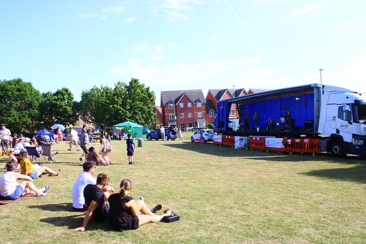 Families enjoying the fun and sunshine at Liphook Carnival Fun Day