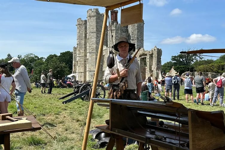 This re-enactor shows off his impressive guns. The Lord Hoptons Regiment of Foote event at Titchfield Abbey.
