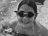 Evelyn, 10, swims 100 lengths for school