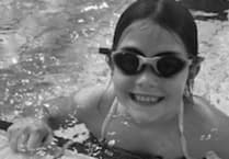 Ten-year-old Evelyn dives into 100-length challenge for Camelsdale School