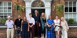 Bethune family return home to a house bearing their name
