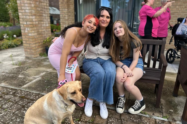 Residents, families, and local dog lovers gather for a paw-some day raising funds for Liphook Day Centre
