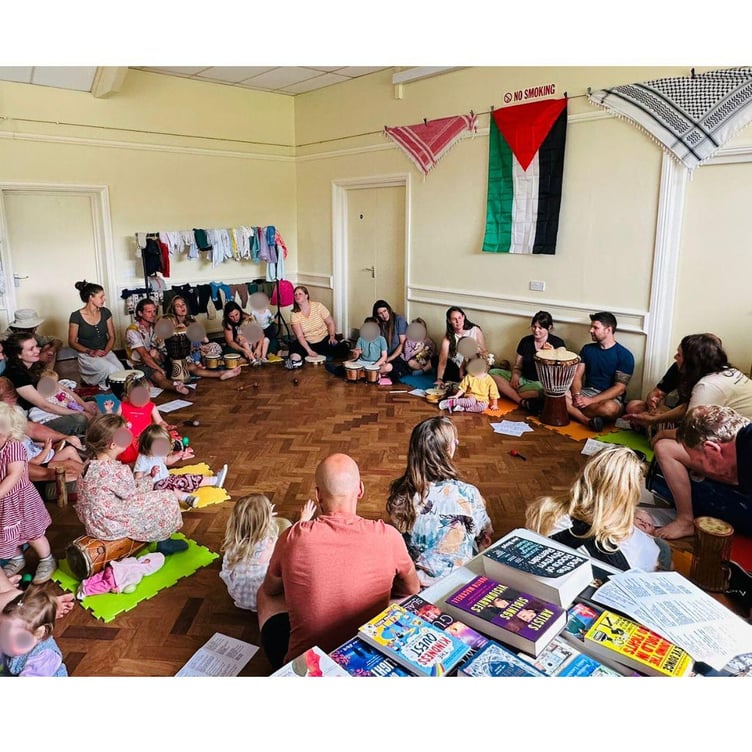 Shirley Stump with volunteers and supporters at Milland Village Hall, where the community raised £2,700 for children affected by the Gaza crisis.