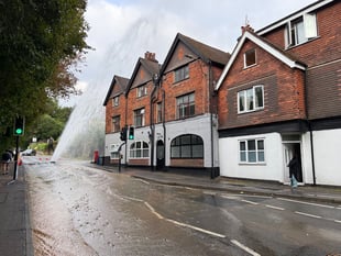 Burst water main shuts main road