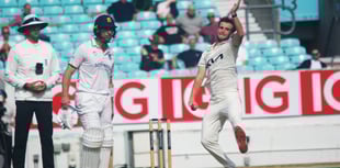 Surrey held to draw as title battle heats up