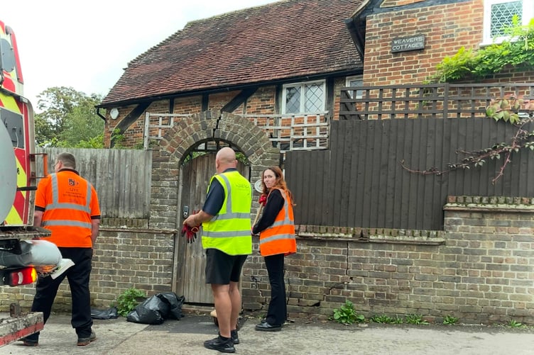 Wall slanting after a traffic incident in Wrecclesham