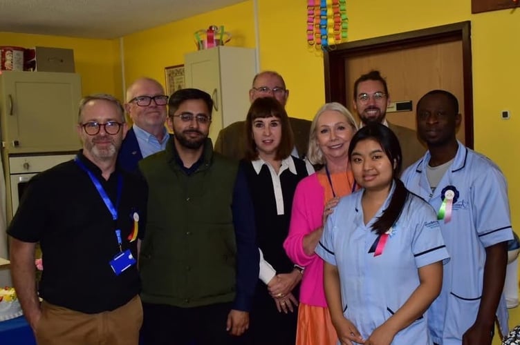 Woodlarks staff and volunteers with Cllr Adeel Shah.