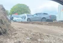 Caravan encampment set up in Surrey Hills National Landscape area