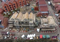 Building work on new homes falls by more than a third in Surrey