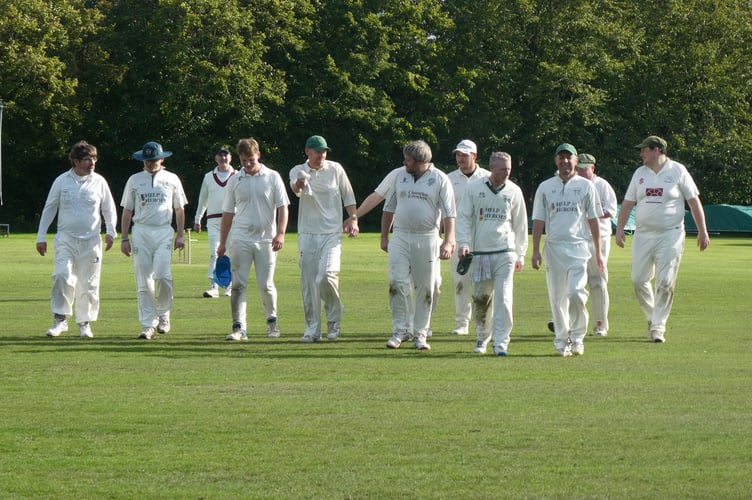 The victorious Waverley side leave the pitch for the last time this year