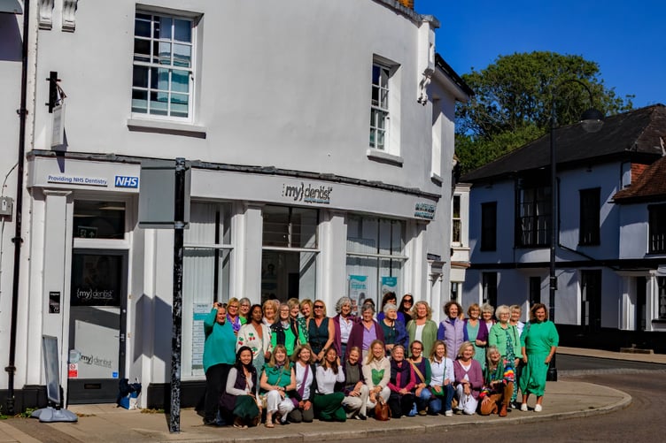 Petersfield Evening WI members recreate a historic photo in the town centre.