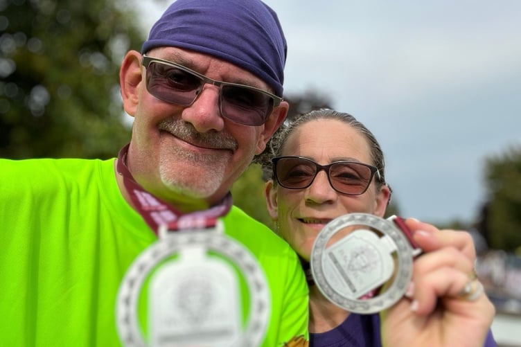 Steve and Lorraine show off their Bacchus medals