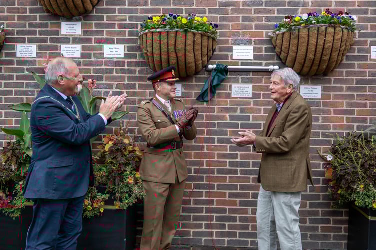 The unveiling of the plaque to Lieutenant Colonel John Luard on Farnham's Notable Names wall.