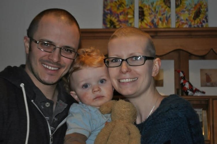 Paula Glover, with her husband and son. A mum who found a lump while breastfeeding was diagnosed with breast cancer. Paula Glover, 46, was breastfeeding her then four-month-old son when she noticed a lump in her right breast. Initially, she thought it was a blocked milk duct, but with a family history of breast cancer, she went to her doctor to get it checked out. A needle biopsy and ultrasound came back inconclusive, so Paula underwent a full biopsy - and was later diagnosed with triple-negative breast cancer.
