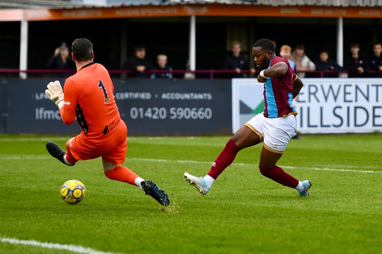 Ogo Obi slots home Farnham Town's opening goal