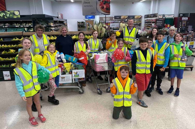 Haslemere Food Bank gave huge thanks to the Haslemere Parish Den Youth Group who filled four trolleys full of much needed items in their annual harvest challenge