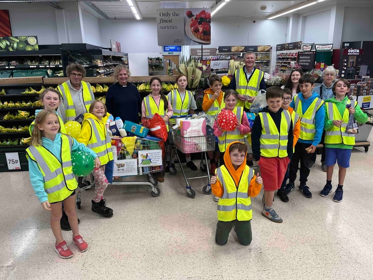 Haslemere Food Bank gave huge thanks to the Haslemere Parish Den Youth Group who filled four trolleys full of much needed items in their annual harvest challenge