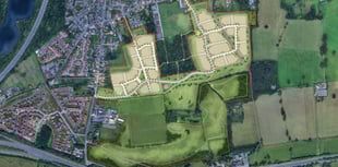 Developer unveils Hogs Back plans for hundreds of new homes