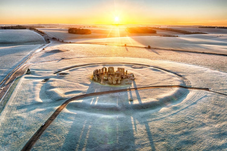 PICTURES OF THE YEAR 2025 - THE BEST OF THE BIIG LADDER:
MORNING HAS BROKEN - STONEHENGE:  A hard frost turns Stonehenge white at dawn in Wiltshire this morning (Friday). as the south of England shivered in temperatures of -3ÂºC . Parts of England are expected to get several inches of snow on Saturday Evening as the cold snap continues into next week. Phototograph By Chris Gorman / Big Ladder. 3rd Jan 2025.