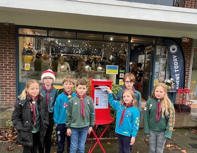 Scouts and Cubs at the Fernhurst Hub launching their annual Christmas card delivery service