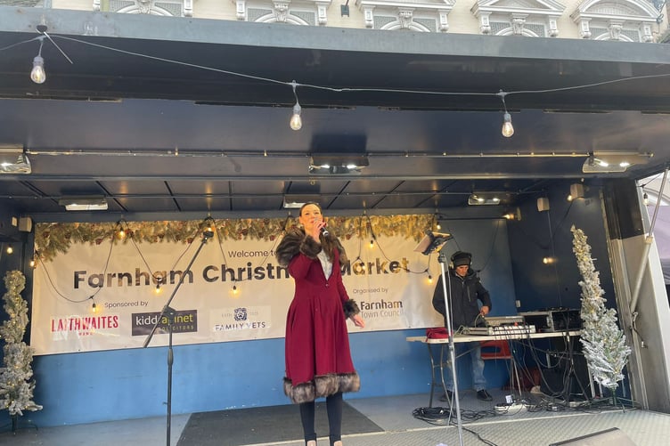 A performer at Farnham Christmas Market 2025.