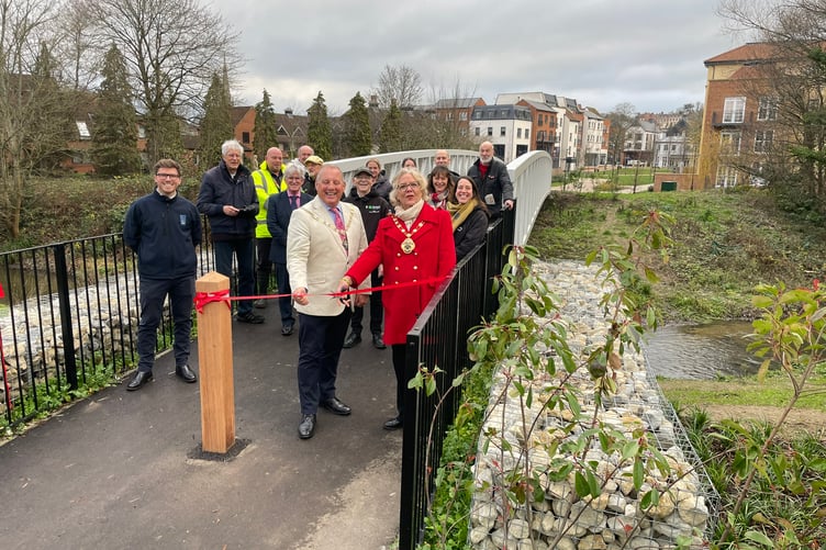 Cllr Penny Rivers and Cllr George Murray cut the ribbon to the new bridge in Farnham.