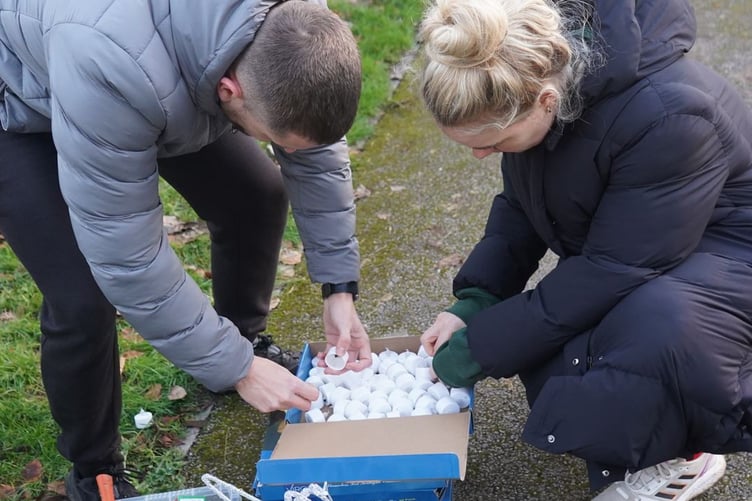 Tealights ready to be put on graves in Badshot Lea
